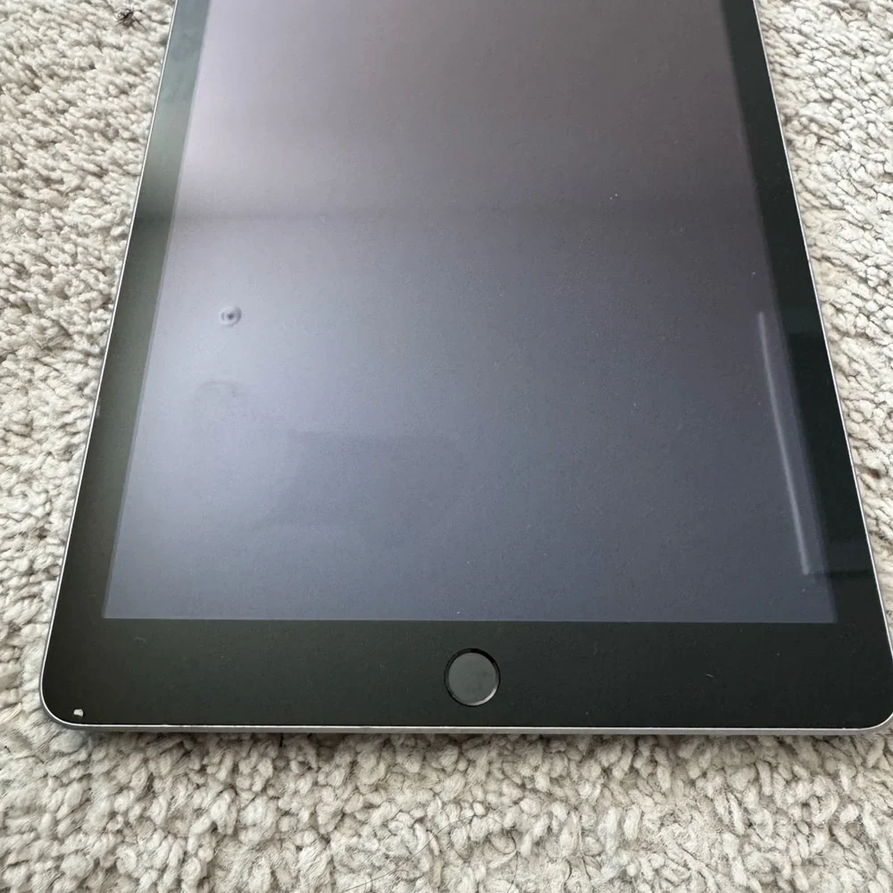 Apple Black iPad with Sleek Design and Thin Bezel